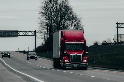A semitruck on the highway | debt collection companies Michigan
